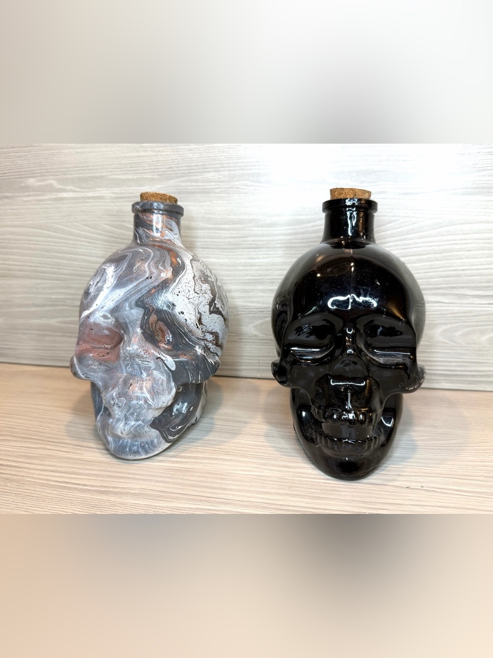 Pair of Skull Glass Bottles with Corks 5 inch Black and Marble Fluid Art Decor